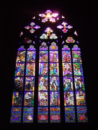 The stained glass inside St Vitus